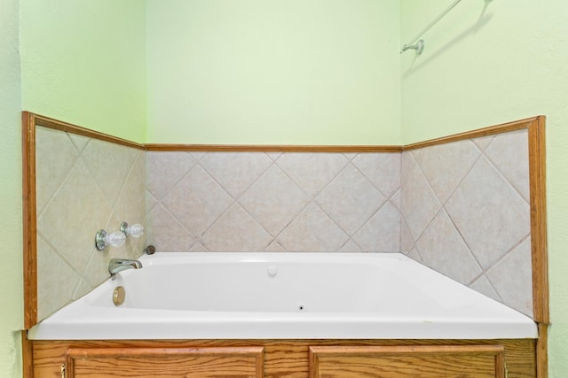 bathroom featuring a washtub