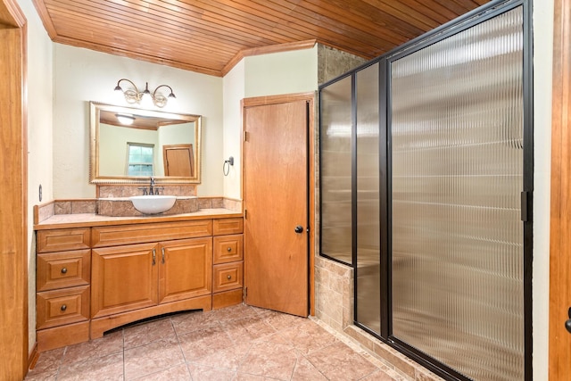 bathroom with vanity, an enclosed shower, wood ceiling, and ornamental molding