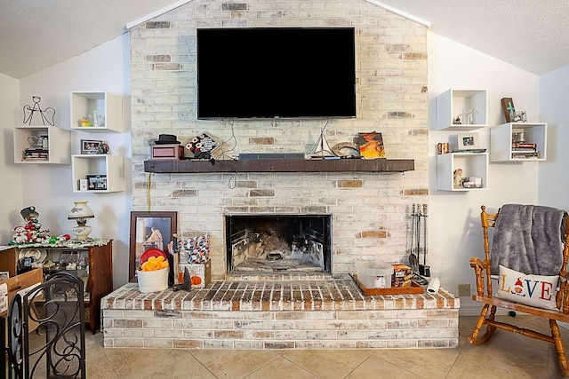 room details featuring a brick fireplace and a textured ceiling