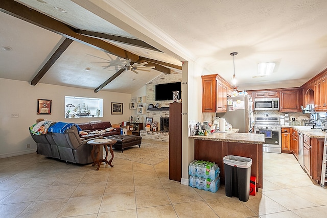 kitchen with vaulted ceiling with beams, light tile patterned floors, appliances with stainless steel finishes, kitchen peninsula, and a fireplace