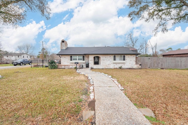 view of front facade with a front yard