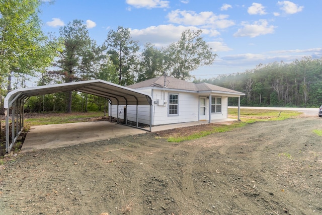 view of front of house featuring a carport