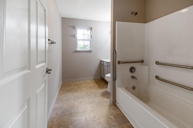 full bathroom with bathing tub / shower combination, vanity, and toilet