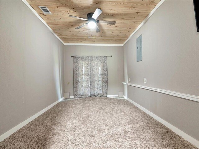 empty room featuring ceiling fan, wooden ceiling, and ornamental molding