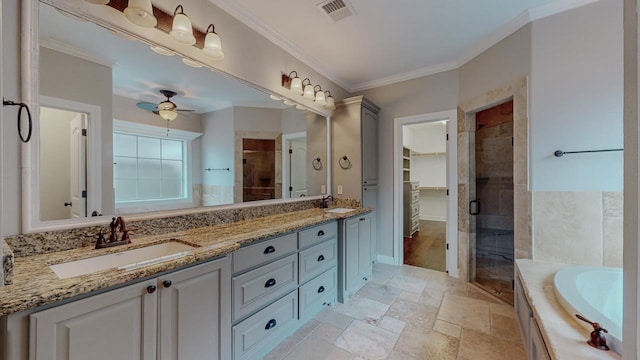 416 Birch View Dr, Lumberton, TX 77657 - bathroom featuring a shower stall, a walk in closet, double vanity, stone tile flooring, and a garden tub