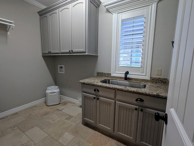 416 Birch View Dr, Lumberton, TX 77657 - laundry room featuring washer hookup, cabinet space, baseboards, stone tile flooring, and ornamental molding