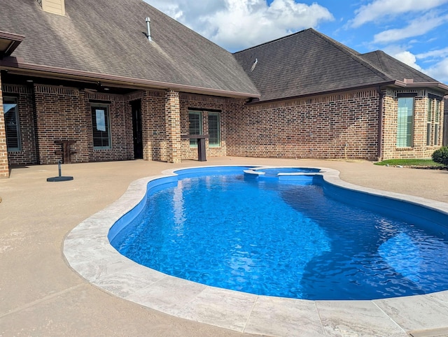 416 Birch View Dr, Lumberton, TX 77657 - view of pool featuring a patio and a pool with connected hot tub