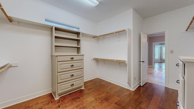 416 Birch View Dr, Lumberton, TX 77657 - walk in closet featuring wood finished floors