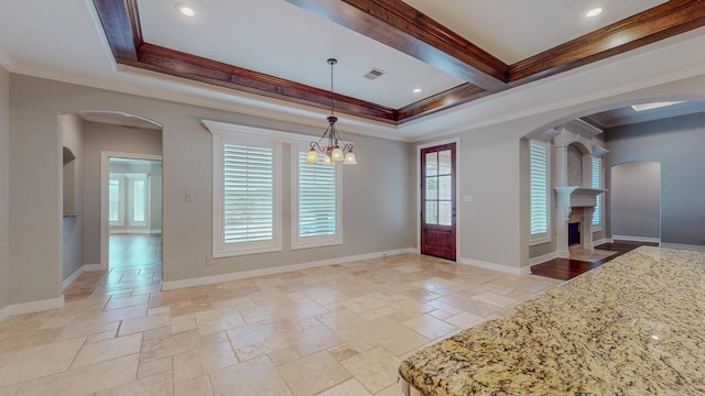 416 Birch View Dr, Lumberton, TX 77657 - foyer entrance with healthy amount of natural light, stone tile flooring, crown molding, arched walkways, and a fireplace