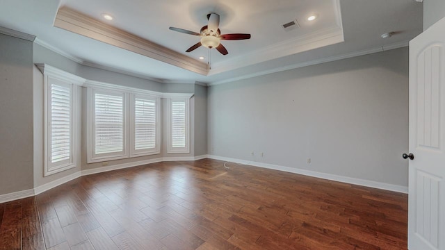 416 Birch View Dr, Lumberton, TX 77657 - empty room featuring plenty of natural light, ceiling fan, a raised ceiling, dark wood-style flooring, and ornamental molding