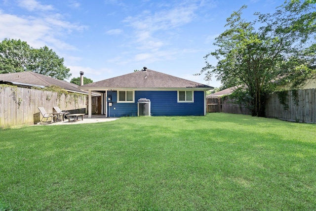 12945 Westchester Ln, Beaumont, TX 77713 - back of property with a patio area, a fire pit, and central air condition unit