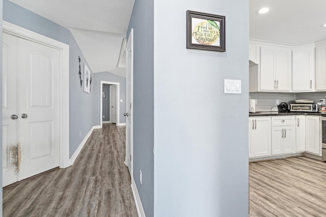 12945 Westchester Ln, Beaumont, TX 77713 - corridor featuring light wood-style flooring, baseboards, and recessed lighting