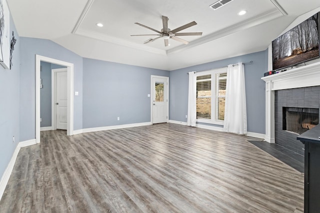 12945 Westchester Ln, Beaumont, TX 77713 - unfurnished living room with a raised ceiling, ceiling fan, wood finished floors, recessed lighting, and baseboards