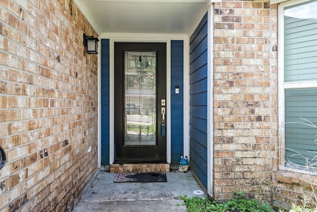 12945 Westchester Ln, Beaumont, TX 77713 - doorway to property featuring brick siding