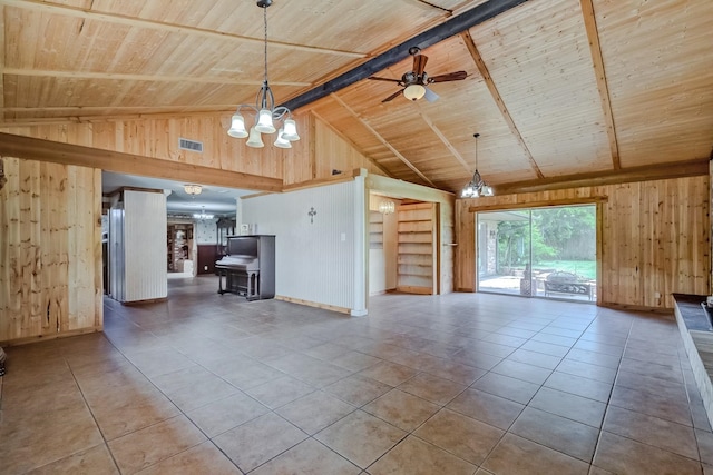 unfurnished living room with wood walls, a chandelier, wooden ceiling, tile patterned flooring, and ceiling fan