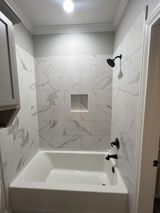 bathroom with crown molding and shower / bathtub combination