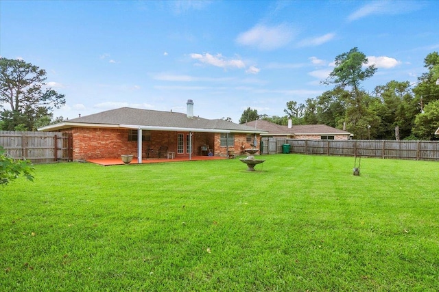 view of yard with a patio area