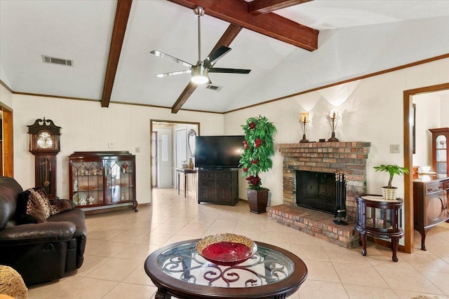 living room with ceiling fan, a fireplace, light tile patterned flooring, and lofted ceiling with beams