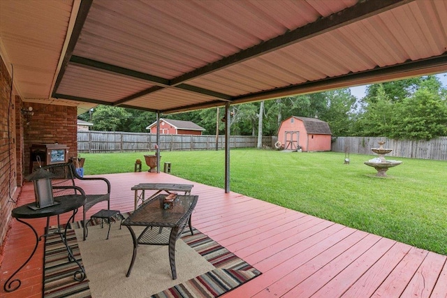 deck featuring a shed