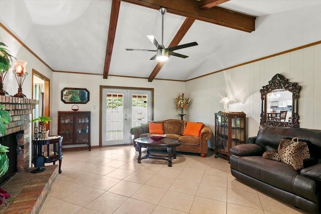 living room with french doors, ceiling fan, lofted ceiling with beams, a fireplace, and light tile patterned flooring