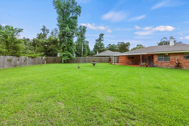 view of yard featuring a patio