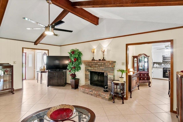 tiled living room with a fireplace and lofted ceiling with beams