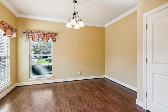 unfurnished dining area featuring dark wood-style floors, crown molding, baseboards, and an inviting chandelier