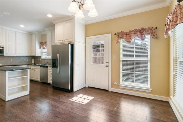 kitchen featuring dark wood-style floors, open shelves, stainless steel appliances, dark countertops, and white cabinets