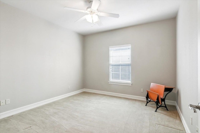 interior space featuring ceiling fan, carpet flooring, and baseboards