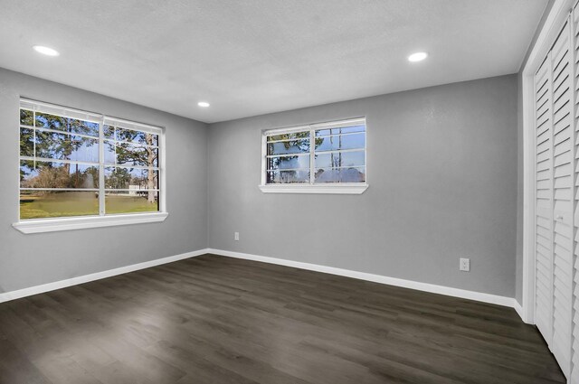 347 W Texas State Highway 63, Jasper, TX 75951 - unfurnished bedroom featuring recessed lighting, dark wood finished floors, and baseboards