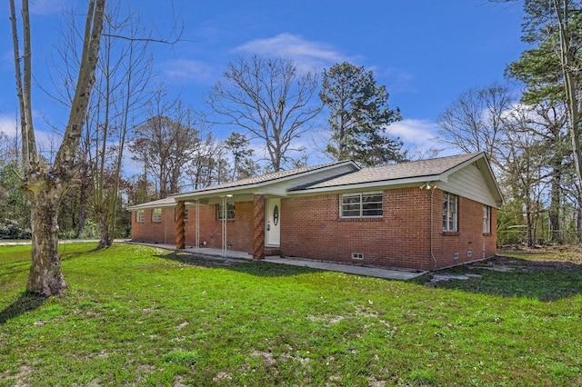 347 W Texas State Highway 63, Jasper, TX 75951 - view of front facade with brick siding, a front lawn, and crawl space