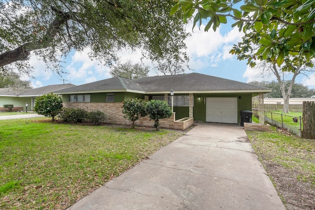 ranch-style home with brick siding, fence, a garage, driveway, and a front lawn