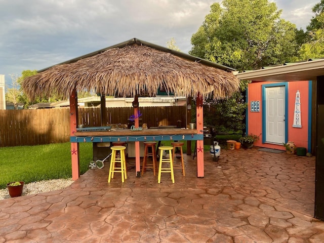 319 Dixie Dr, Bridge City, TX 77611 - fenced backyard featuring a patio area