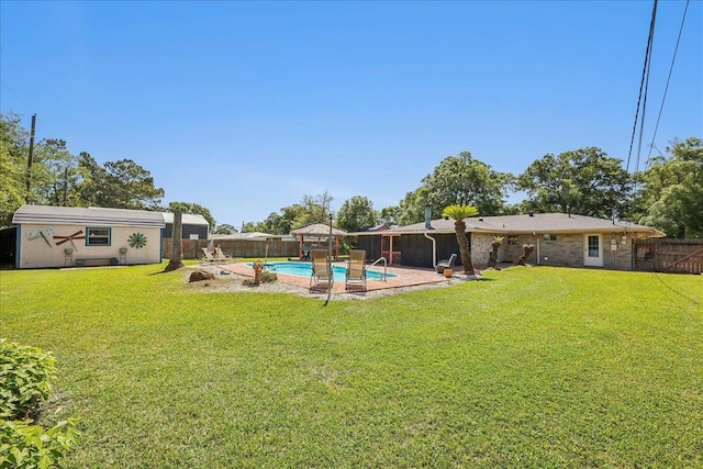 319 Dixie Dr, Bridge City, TX 77611 - view of yard featuring an outbuilding