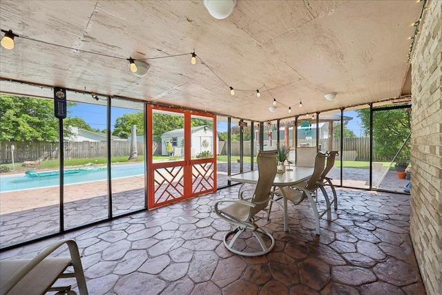 319 Dixie Dr, Bridge City, TX 77611 - unfurnished sunroom featuring plenty of natural light