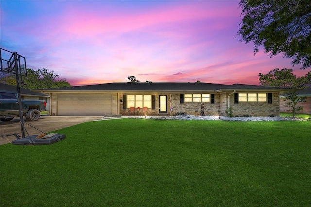 319 Dixie Dr, Bridge City, TX 77611 - single story home featuring a garage, a yard, concrete driveway, and brick siding