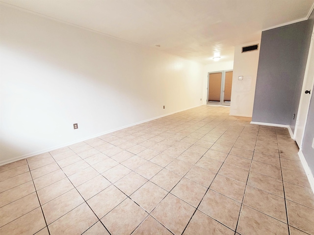 view of tiled spare room