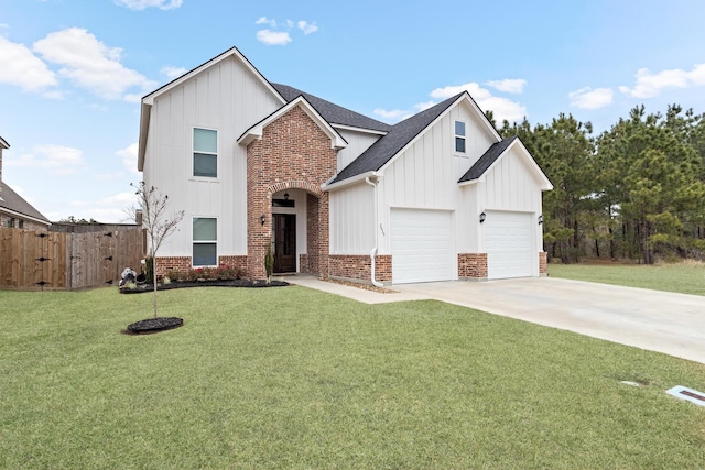 view of front facade with a garage and a front yard