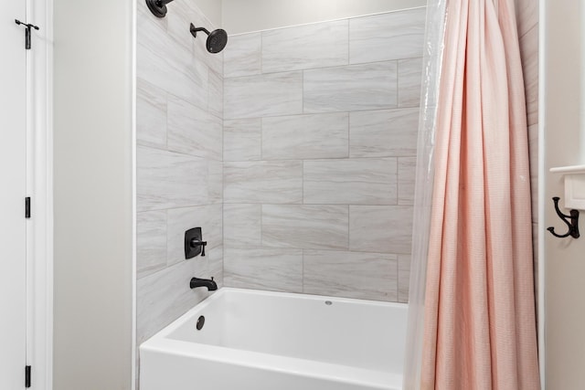 bathroom featuring shower / bathtub combination with curtain