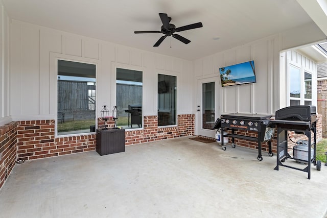 view of patio / terrace featuring ceiling fan