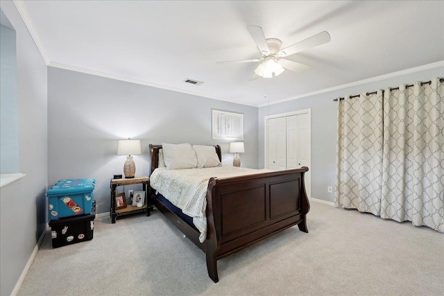 1550 Belvedere Dr, Beaumont, TX 77706 - bedroom featuring light colored carpet, baseboards, crown molding, ceiling fan, and a closet