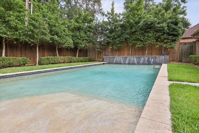 1550 Belvedere Dr, Beaumont, TX 77706 - view of swimming pool with a fenced backyard