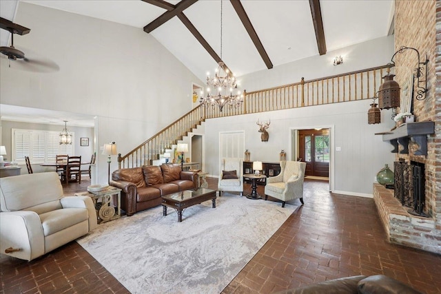 1550 Belvedere Dr, Beaumont, TX 77706 - living area with a chandelier, high vaulted ceiling, stairway, ceiling fan, and a fireplace