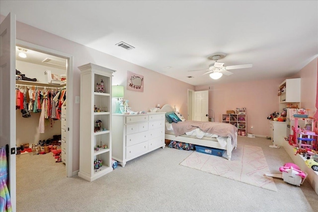 1550 Belvedere Dr, Beaumont, TX 77706 - bedroom featuring carpet, a spacious closet, ceiling fan, and a closet