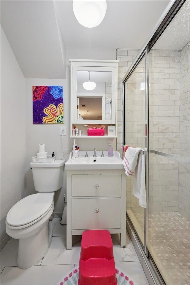 1550 Belvedere Dr, Beaumont, TX 77706 - full bathroom with vanity, a shower stall, toilet, and marble finish floors