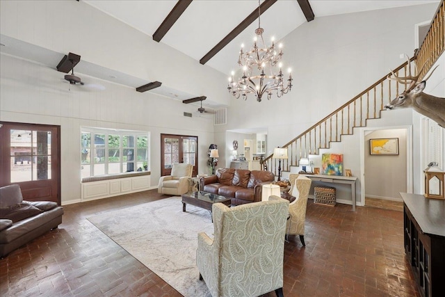 1550 Belvedere Dr, Beaumont, TX 77706 - living room featuring brick flooring, high vaulted ceiling, a chandelier, stairway, and beam ceiling