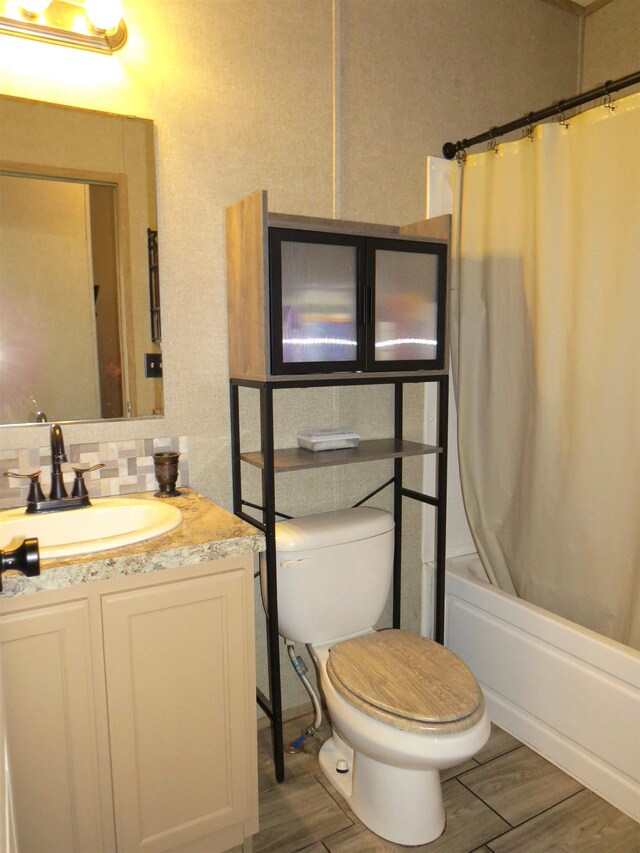 14547 Oak Leaf Loop, Splendora, TX 77372 - full bathroom with vanity, toilet, shower / tub combo with curtain, and wood finished floors