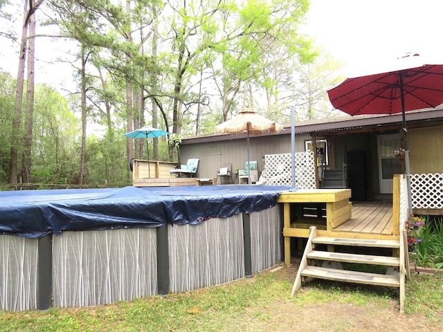 14547 Oak Leaf Loop, Splendora, TX 77372 - wooden terrace featuring a covered pool