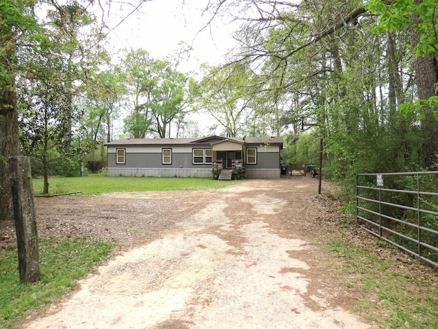 14547 Oak Leaf Loop, Splendora, TX 77372 - manufactured / mobile home with driveway