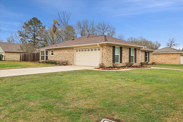 ranch-style home featuring a garage and a front lawn